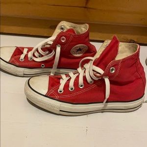 Red High top Converse.